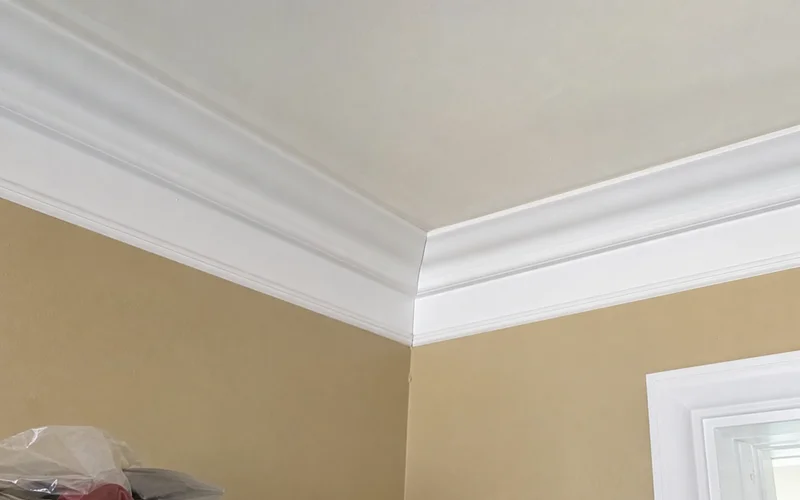 Close-up of a clean coped inside corner joint