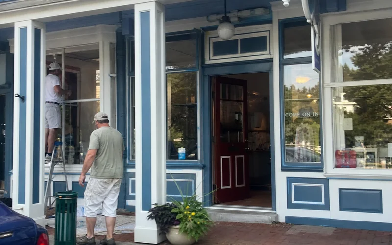 Small retail storefront in Simsbury with freshly repaired trim